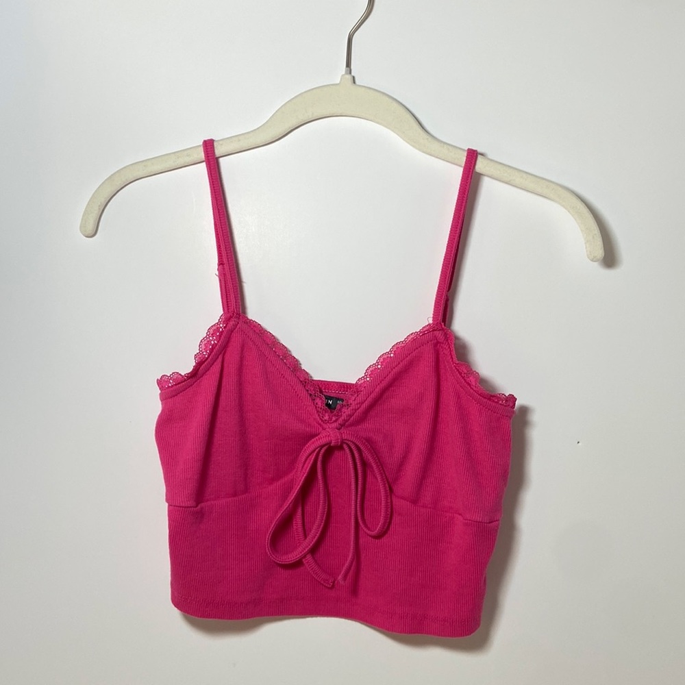 Pink lace tie tank top. Size: Extra Small Condition: Worn once